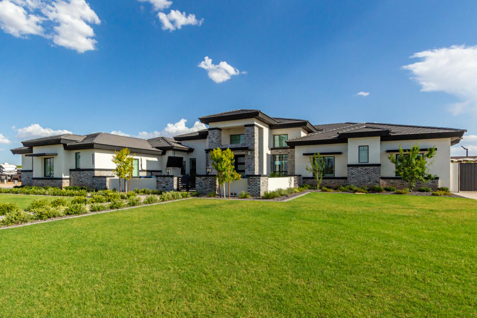 Beautiful lawn with green grass installed by New Era Landscaping